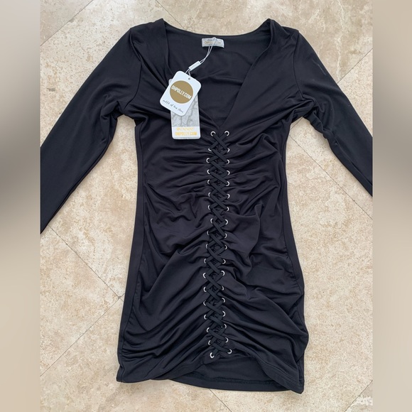 Oh Polly Dresses & Skirts - NWT black mini dress from Oh Polly